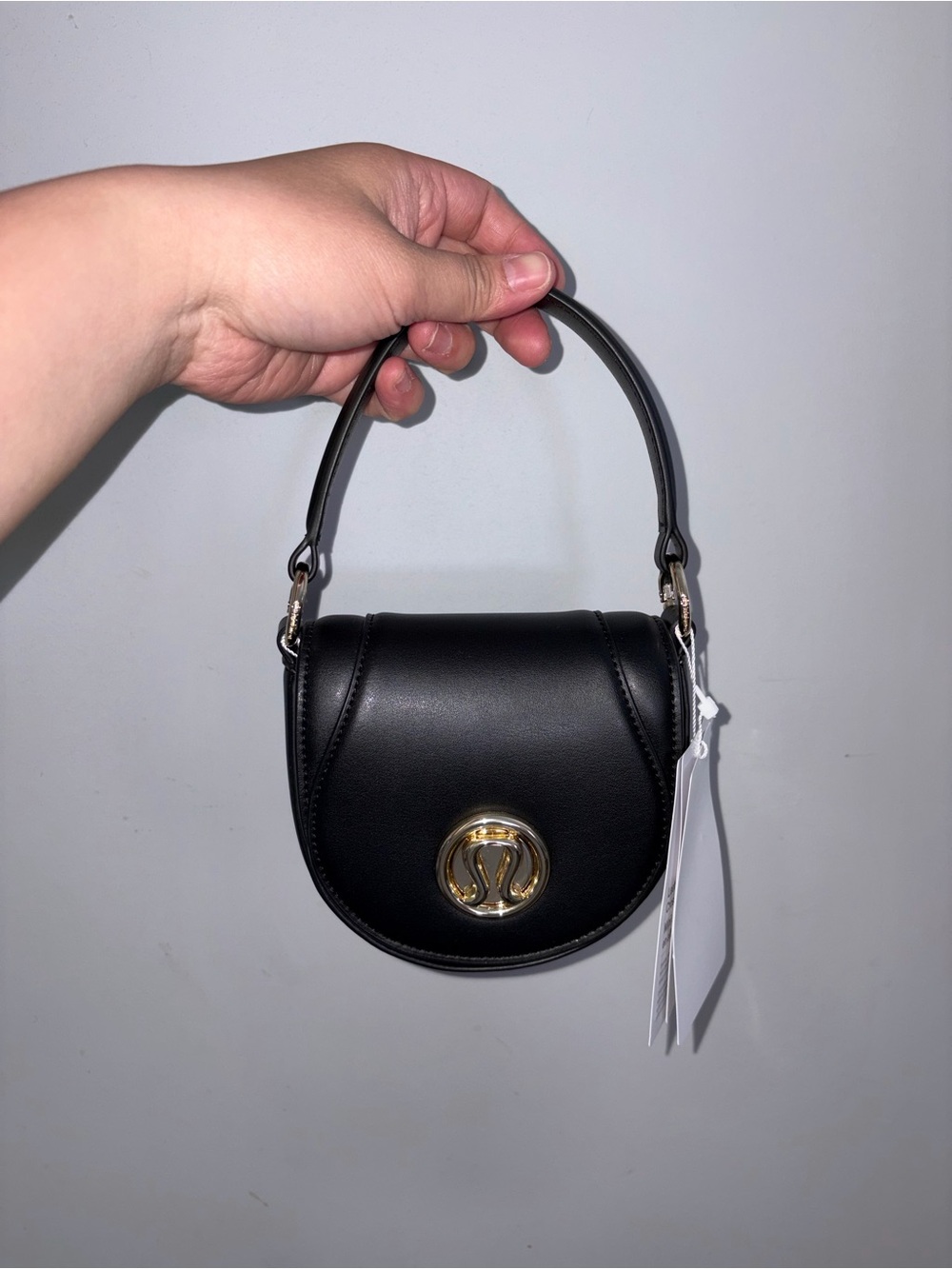 lululemon athletica Black Mini Top-Handle Bag with Gold Emblem